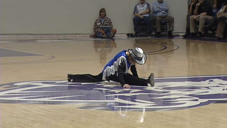 93-year-old dancer Jean Petty does the splits as she performs a solo.
