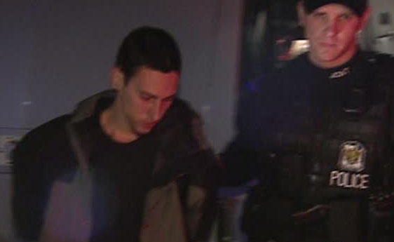 Officers arrest Miguel Chavarria Thursday morning.