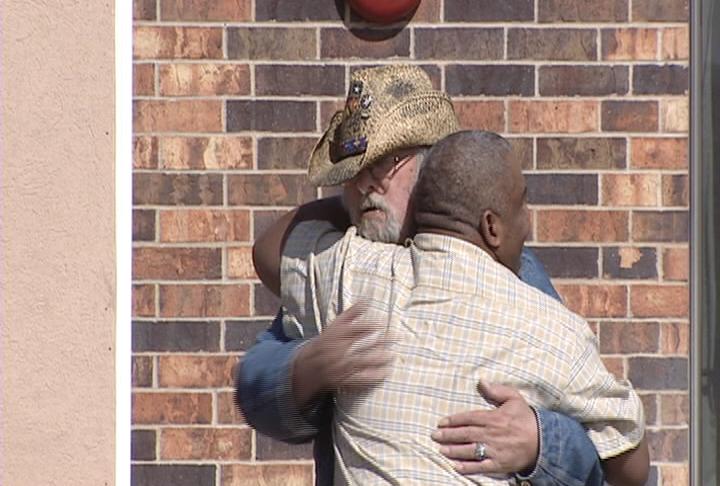Ricardo Brea says goodbye to a friend after being told he must leave his transition housing apartment.
