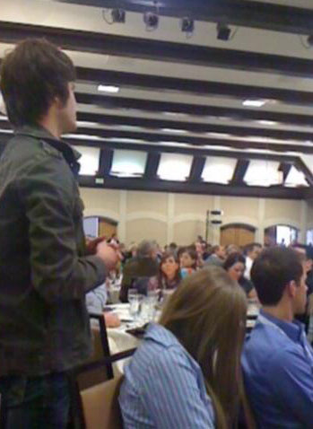 Video taken by a friend shows Stevie Smith standing to ask former NYC Mayor Rudy Giuliani a question