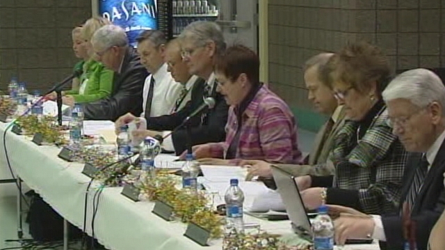 Members of the Box Elder County School Board address members of the community.