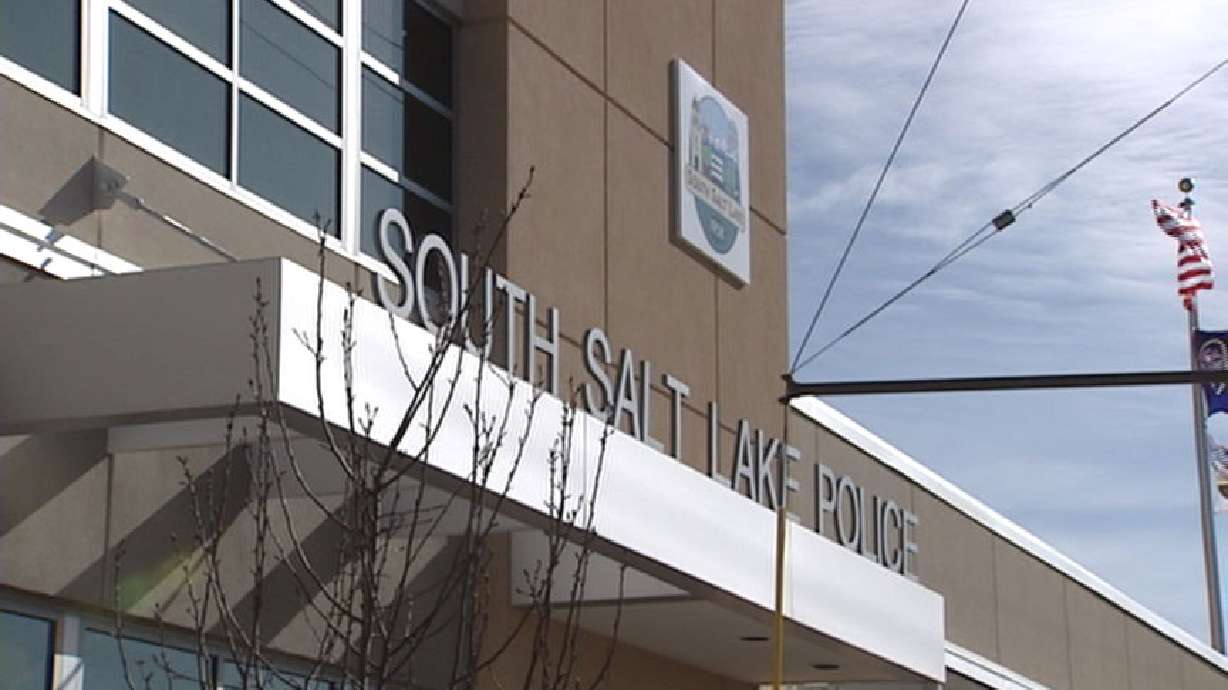 A South Salt Lake police officer trainee was arrested while on duty and accused of driving and carrying a weapon while under the influence.