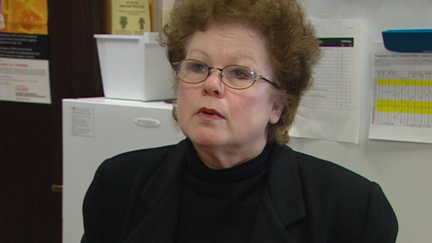 Sharon Moon, an immunization coordinator with the Salt Lake Valley Health Department, speaks to KSL about throwing away the expired doses.