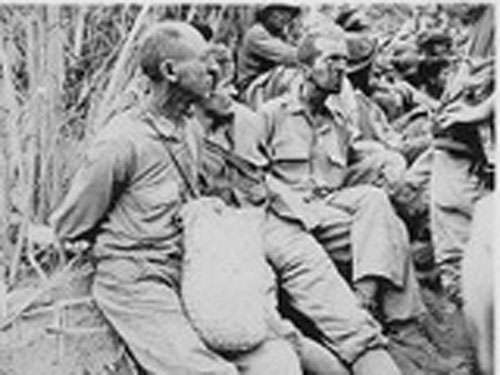 Starving American and Filipino prisoners of war on the Bataan Death March, May 1942
National Archives
