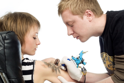 Despite popularity of tattoos, most adults still hide theirs