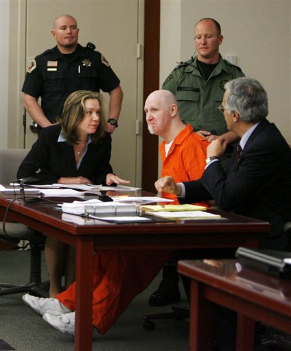 Convicted murderer Ronnie Gardner sits with his defense team, Megan Moriarty, left, and Andrew Parnes at the Matheson Courthouse. (AP Photo/Francisco Kjolseth)