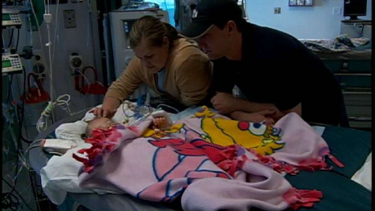 Separated Twins Given Sips of Water