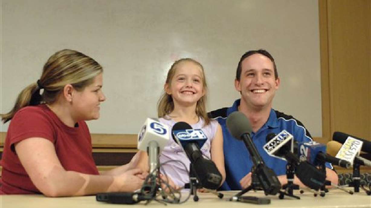 Twins' Father: 'It was like seeing them born again'