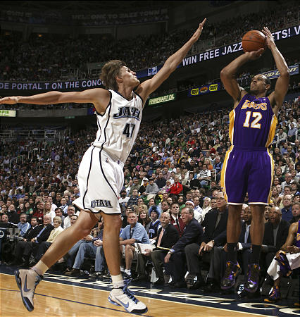 Andrei Kirilenko (left))(Jazz) defends Shannon Brown(Lakers) at the EnergySolutions Arena. Wednesday, February 10, 2010. (Michael Brandy, Deseret News)