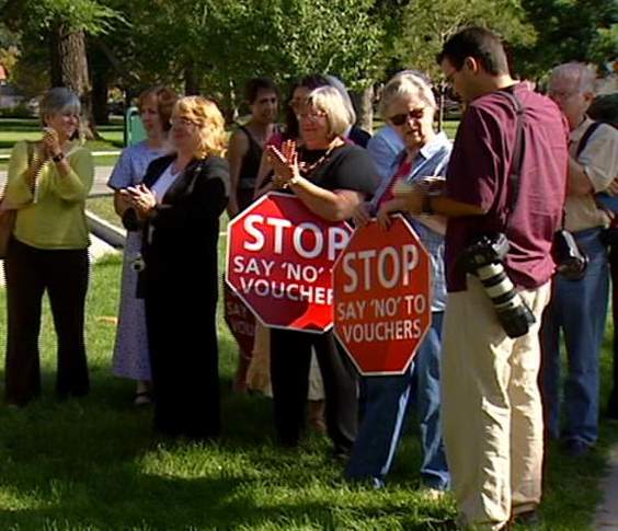 Group Rallies against Voucher Program