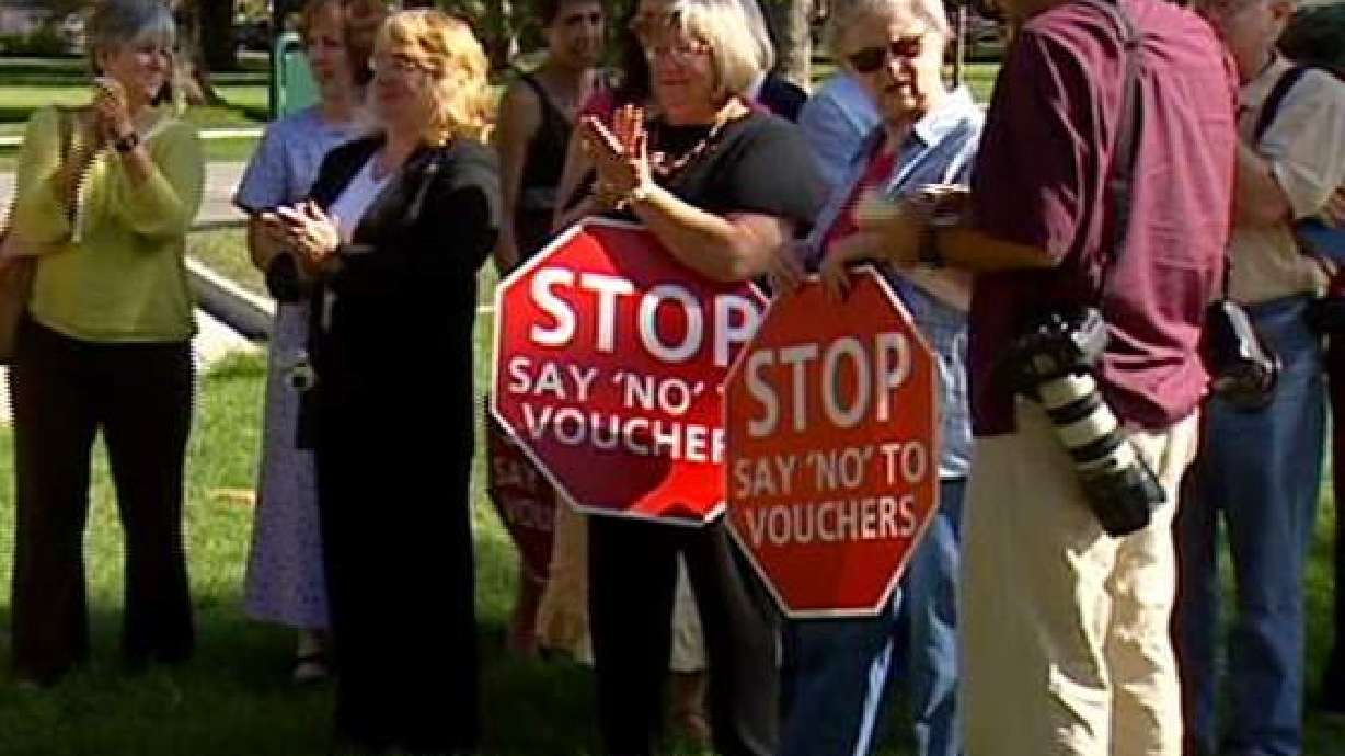 Group Rallies against Voucher Program