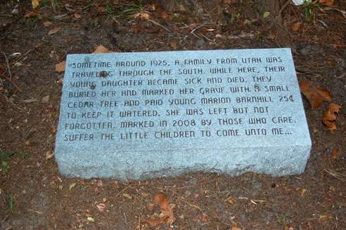 The grave now has a marker, telling some of the story and ending with powerful words. Click to enlarge and read.