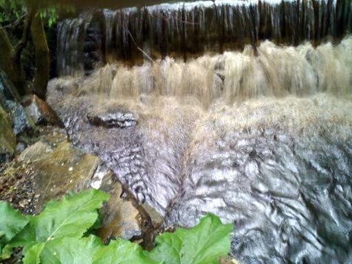 The oil spilling into Red Butte Creek.