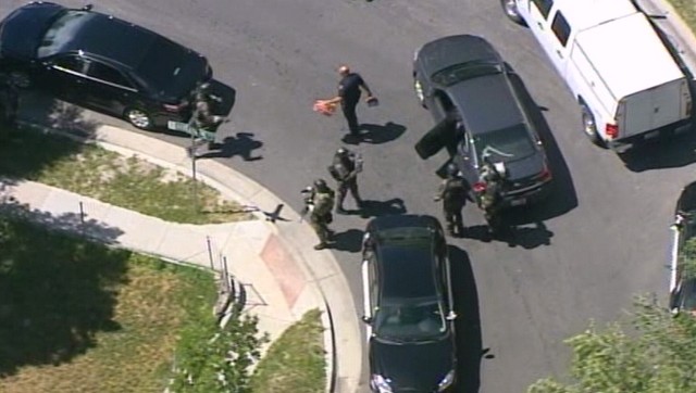 A Salt Lake City neighborhood was on lockdown as police and a SWAT team searched for an armed gunman.