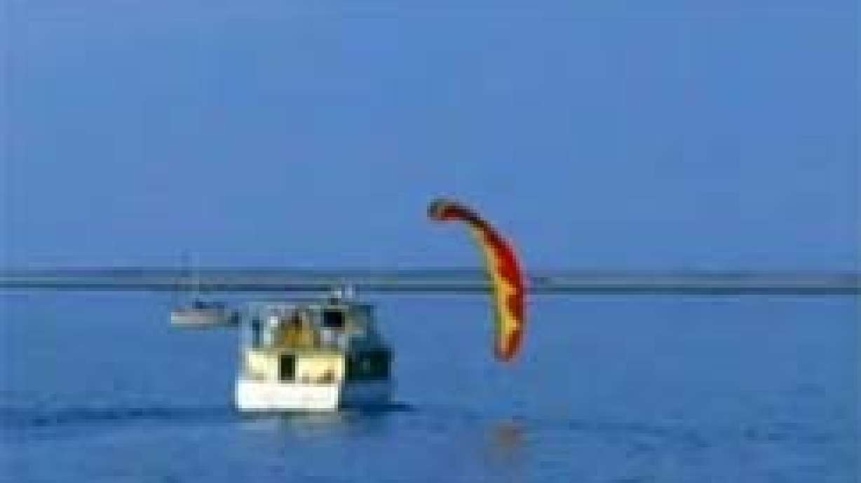 Schanze Flies Paraglider Within Feet of Boat