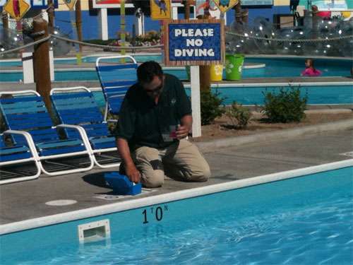 Health officials demonstrated the cryptosporidium testing procedures at Cowabunga Bay Water Park in Draper Friday