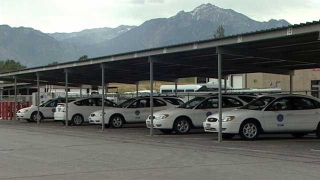 A row of state fleet vehicles
