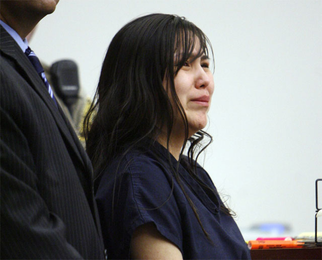Mae Goodman Johnson stands alongside her attorney Clayton Simms as the little girl's father speaks in Third District court at the Matheson Courthouse in Salt Lake City on Friday, July 2, 2010. Johnson was sentenced to 1-15 years with credit for time served of 1-year, 11-months and 25-days.
