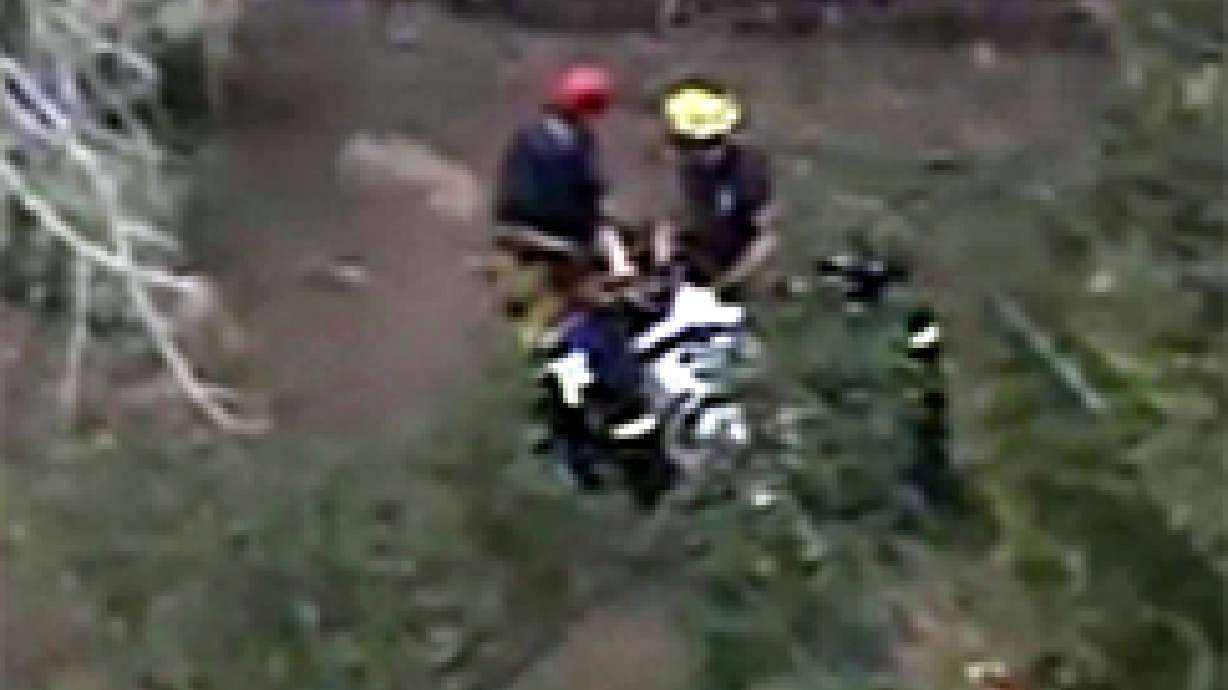 Crews Rescue Man Pinned by Rock