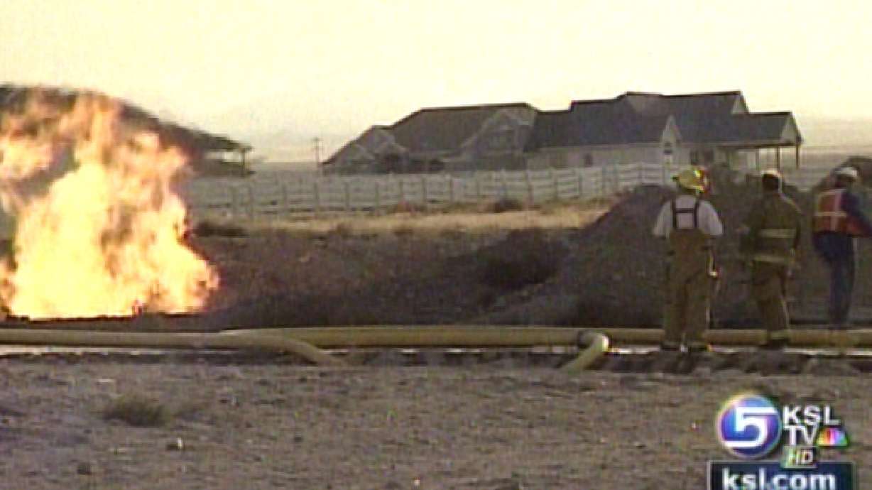 Fire Sparked when Backhoe Struck Metal