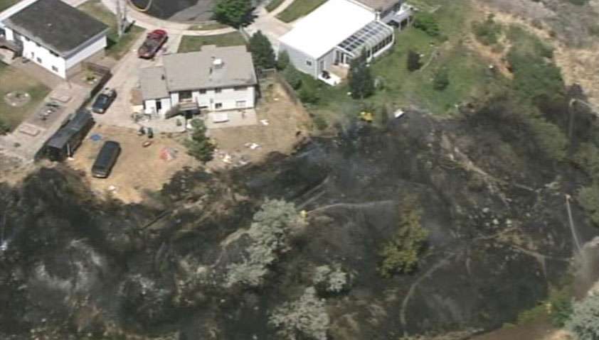 A fire that began in a fire pit approached homes backing a gully near 9000 South and 500 East in Sandy. Fire crews were able to save the homes, but say they got lucky.