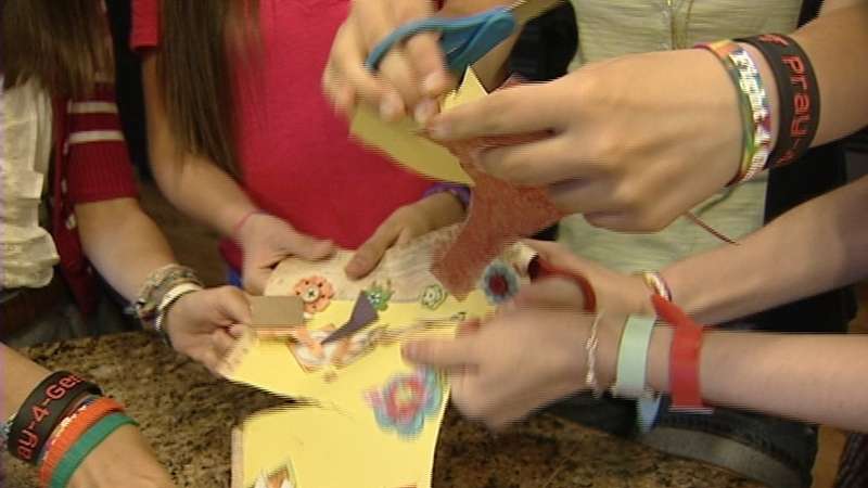 Now that Gentrie Hansen can eat again, she and her friends decided it was time to cut up the 'Kitchen Closed' sign.
