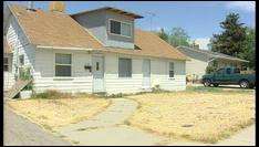 Woman Accused of Not Watering Lawn Pleads Not Guilty