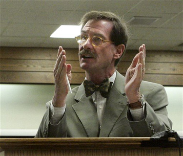 Defense attorney Walter F. Bugden asks the judge to dismiss the charges against Warren Jeffs during his trial Tuesday, Sept. 18, 2007, in St. George, Utah. (AP Photo/Douglas C. Pizac, Pool)
