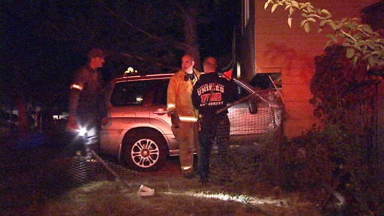 Car Crashes Into House