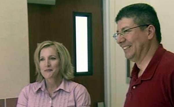 Kathy Campos, the defendant's wife, and Conrad Campos, the defendant's brother, at court Monday during jury selection.