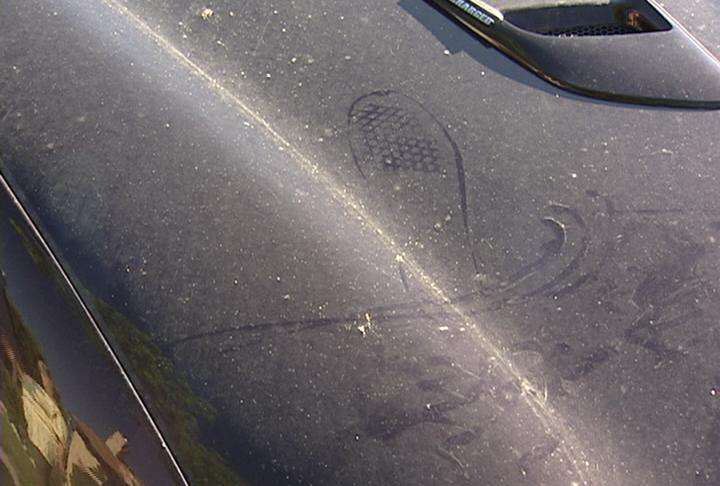Police say footprints left on a few of the vehicles should help them identify the vandals.