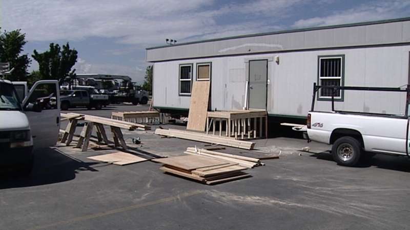 Employees at Colonial Building Supply are now doing business out of a mobile home in the parking lot.