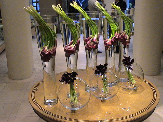 Jeff never uses leaves and puts the flowers at an angle -- even occasionally upside down.