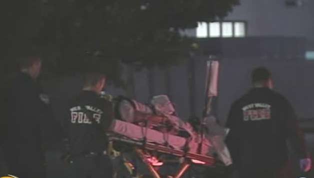 Woman pinned by car at West Valley business