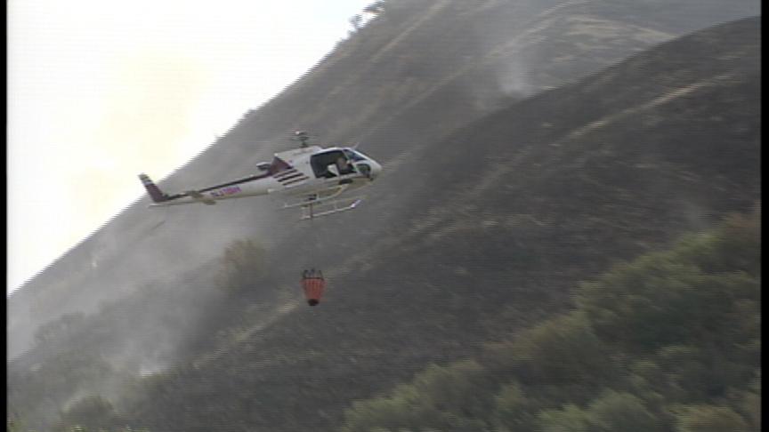 Firefighters Work To Contain East Bench Fire