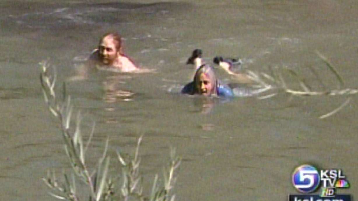 Activists Go for Swim in Jordan River