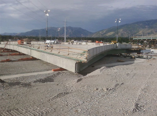 Crews will grease up Teflon pads with oil and push the bridge out over the interstate on steel skid beams
