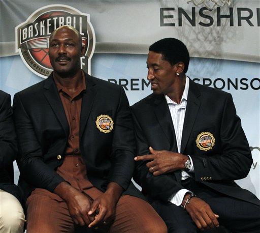 Malone gives short Hall of Fame jacket to boy