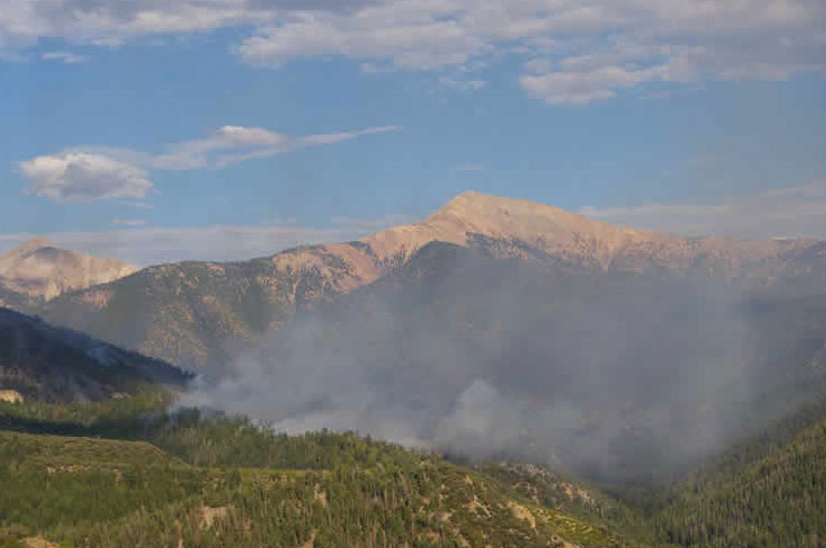 Twitchell wildfire burning close to highways once again