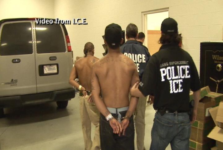 Video provided by ICE shows law enforcement officers arresting two men