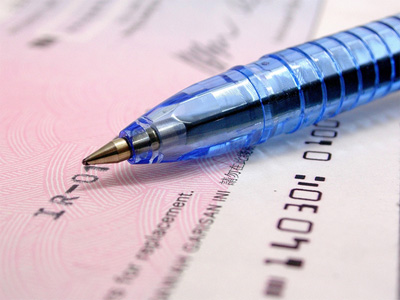 Former employee of online university pleads guilty to fraud