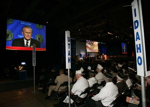 Secretary of Defense Donald Rumsfeld, on stage and on the monitor, speaks during the American Legion national convention Tuesday, Aug. 29, 2006, in Salt Lake City, Utah. (AP Photo/Douglas C. Pizac)