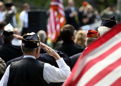 American Legion Post Commander John Sheets of Farmington, Utah, salutes the flag during the playing of the National Anthem at a freedom rally in Liberty Park, Wednesday, Aug. 30, 2006, in Salt Lake City. (AP Photo/Steve C. Wilson)