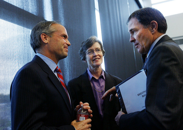 Mark De Young, President and CEO of ATK, Ann Millner, President of Weber State University, and Utah Governor Gary Herbert talk after a press conference announcing that ATK will open a new facility in Davis County to manufacture commercial and military airframes and commercial engine structures at Clearfield City Hall on September 9, 2010. (Photo/Laura Seitz)