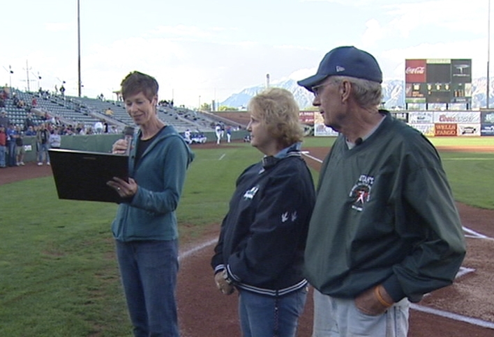 Ken Kopinski stands next to his wife as he is formally recognized by the Ogden City Council for his volunteer work.