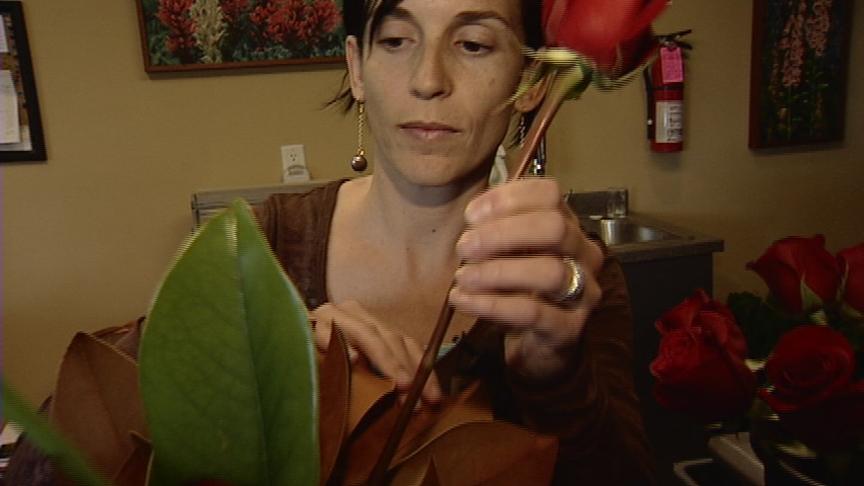Florist Lisa Seig says she knows she will probably never see the $8,000 Clark owes her.