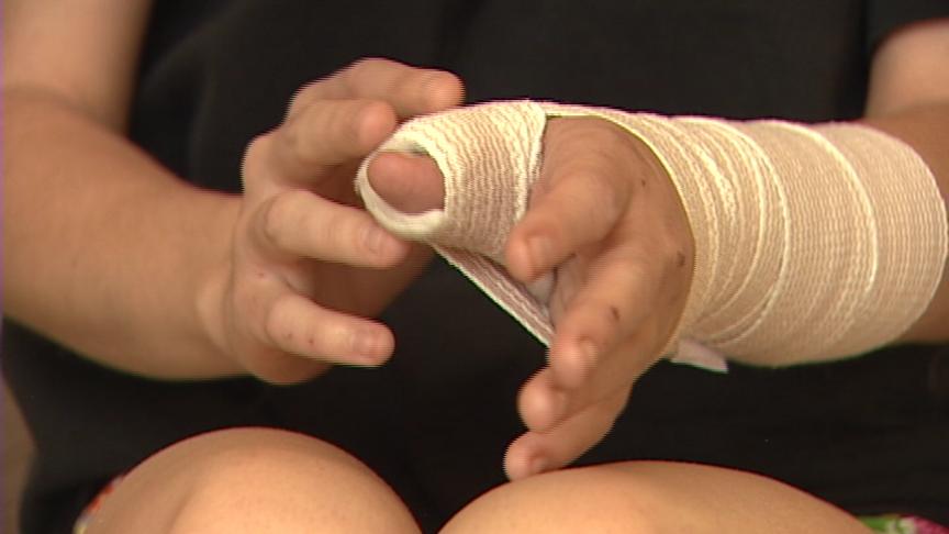 Ashley Forsland broke her thumb while attempting to protect her head as her teenage neighbor was beating her with a hammer.