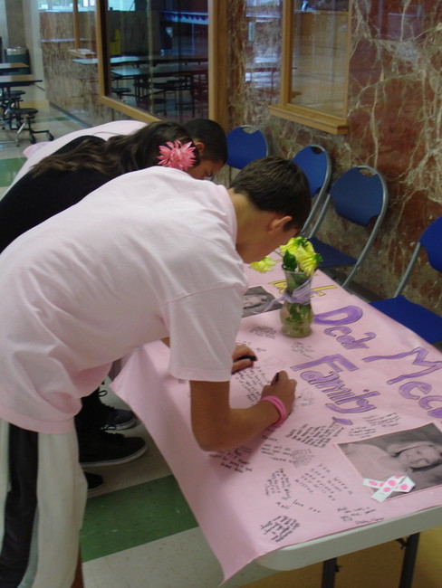 Students honored Madison Mecum Friday at Orem Junior High School by wearing pink and signing a poster in her honor. - Photo courtesy Rhonda Bromley, Alpine School District