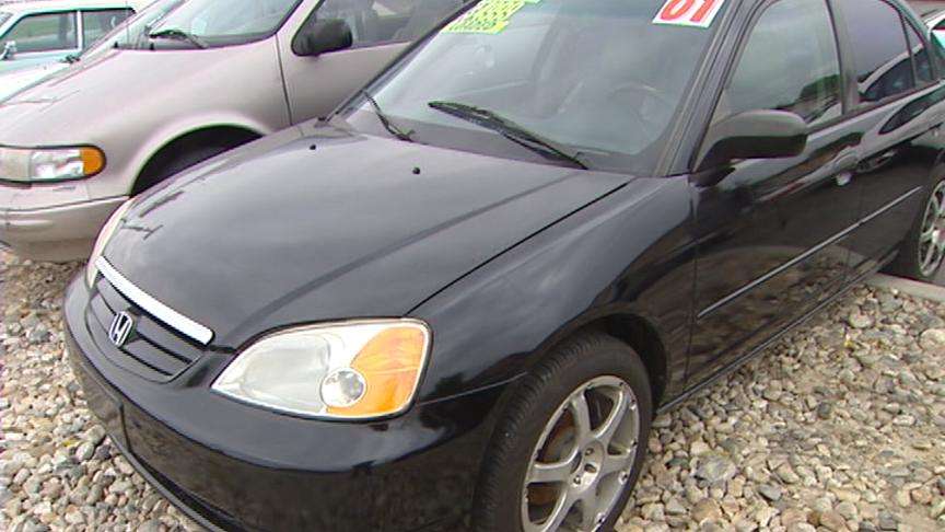 The owner of this black Honda says suspect and female companion attempted to test drive his car shortly before they stole a Honda Prelude from a nearby car dealership.