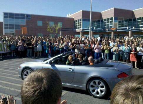 Dane Zdunich was welcomed back to his school by a crowd of students Wednesday afternoon. - Photo courtesy Brandon Danger